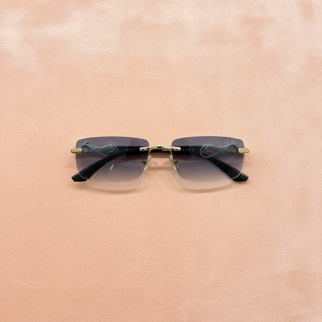Cartier Panthère sunglasses flat lay top-down - peach background