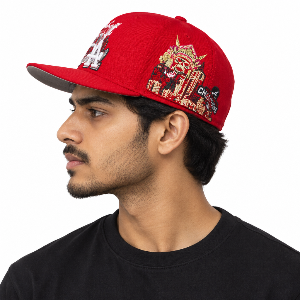 Male model wearing red cap side profile white background