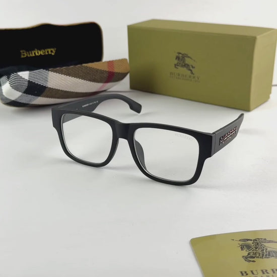 Black Burberry eyeglasses with packaging on a white background
