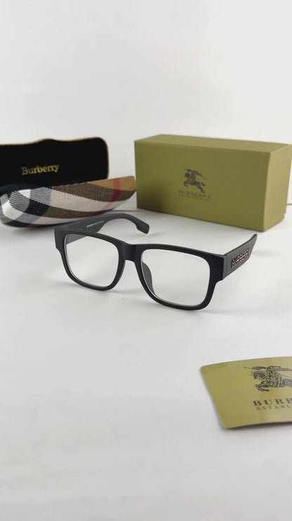 Black Burberry eyeglasses with packaging on a white background